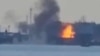 Fotografie publicată de Statul Major al Ucrainei, cu o explozie a unui vas din portul Caucaz. 23 iulie 2024.