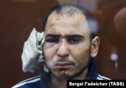 Саідакрамі Рачабалізода, підозрюваний у вчиненні теракту, у залі суду. Під час затримання йому відрізали частину вуха