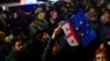 Georgienii au ieșit în stradă pentru a opri un proiect de lege care le-ar aduce țara mai aproape de modelul totalitar din Rusia, îndepărtându-i de valorile democratice europene. Tbilisi, 2 martie 2023.