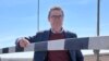 Armenia - Former NATO Secretary General Anders Fogh Rasmussen stands at an Armenian border checkpoint leading to the Lachin corridor, March 14, 2023.