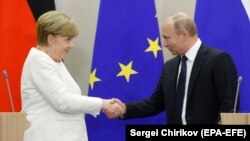 Канцлер Німеччини Анґела Меркель і президент Росії Володимир Путін, Сочі, 18 травня 2018 року