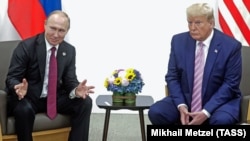 Зустріч російського лідера Володимира Путіна і президента США Дональда Трампа на полях саміту «Групи двадцяти» в японській Осаці, 28 червня 2019 року 