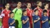 Armenia - Henrikh Mkhitaryan (L) and other Armenia players sing the national anthem before a Euro 2016 qualifying match against Albania, Yerevan, 11Oct2015.