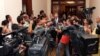 Armenia - TV and other journalists interview an opposition leader in Yerevan.