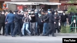 Armenia - A screenshot of a video of thugs beating up an opposition protester in Yerevan's Erebuni district on 22 April 2018. 