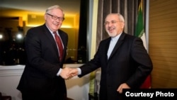 سرگی ریابکوف در کنار محمدجواد ظریف