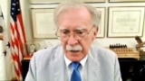 United States - former US national security adviser John Bolton speaking to RFE/RL - screen grab
