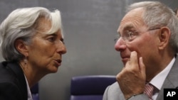 Ministri finansija Francuske i Njemačke, Christine Lagarde (L) i Wolfgang Schaeuble (D) prije sastanka ministara finansija eurozone u Luksemburgu, 20. juni 2011. godine