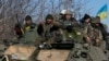 Українські військовослужбовці після відступу з Дебальцева. 18 лютого 2015 року