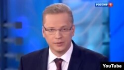"Rossiýa 1" telekanalynyň agşamky gepleşiginden alnan şekil, 31-nji mart, 2014.
