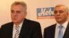 Tadašnji lider SNS-a Tomislav Nikolić sa liderom SNP-a Andrijom Mandićem u Podgorici, novembar 2011.