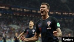 Маріо Манджукич святкує свій вирішальний гол у ворота англійців, Москва, 11 липня 2018 року