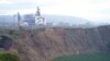 Так виглядає солерудна фабрика в Солотвині. На першому
плані — карстове провалля, яке заповнила солена вода. ЗВідки вода прибуває - так і невідомо.
(фото надане ГУ МНС в Закарпатській області)