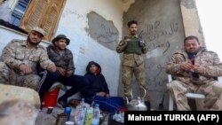 نیروهای هوادار دولت «وفاق ملی» در این عکس از ۱۲ ژانویه در طرابلس