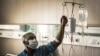 Iran -- A patient in a hospital in Tehran, undated.