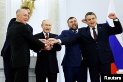 На церемонії проголошення анексії чотирьох українських областей – Донецької, Луганської, Херсонської та Запорізької. Вересень 2022 року