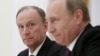 Nikolay Patruşev (solda) və Vladimir Putin