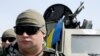 Українські прикордонники під час презентації дипломатам іноземних країн елементів інтегрованої системи охорони на державному кордоні з Росією. Пункт пропуску «Гоптівка» (Харківська область), 22 червня 2016 року (ілюстраційне фото)