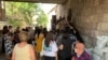 Armenia -- Schoolteachers wait outside a policlinic in Yerevan to get tested for COVID-19, September 9, 2020