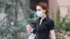 Armenia -- A woman wears a face mask in Yerevan, August 11, 2020.